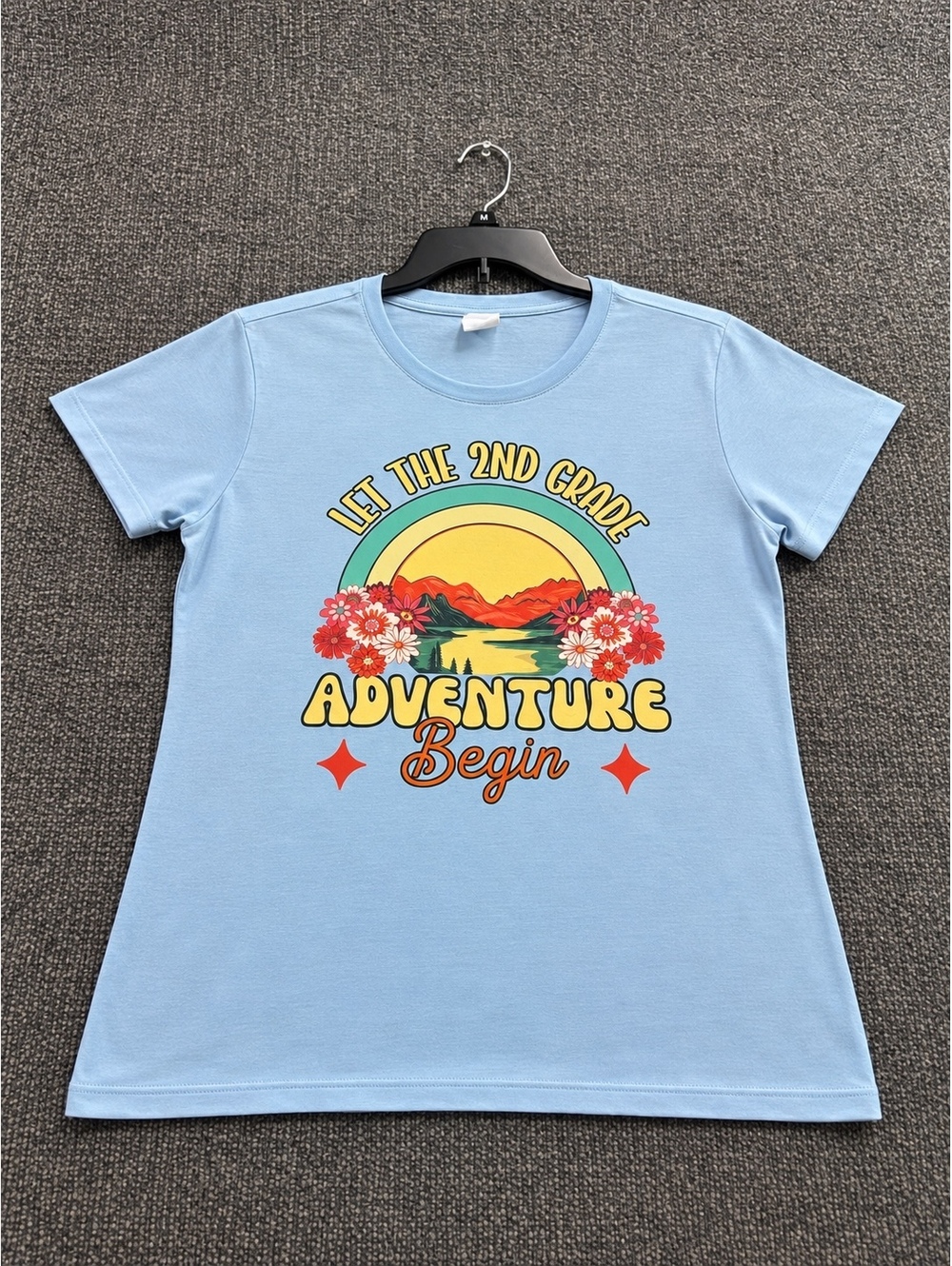 Port & Company Women's Light Blue Graphic T-Shirt Let The 2nd Grade Adventure Be